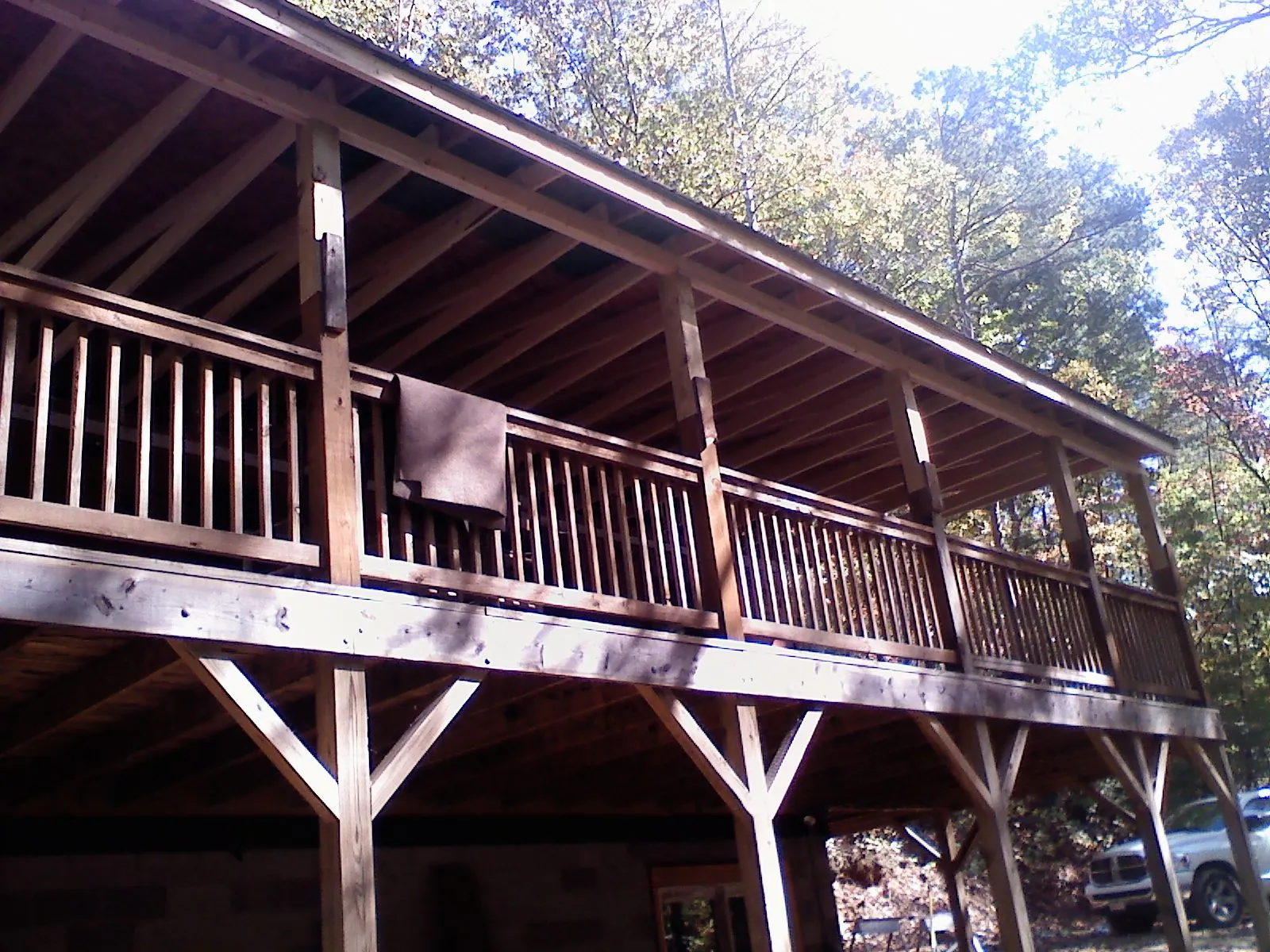 Timber framing under a new elevated porch and deck — Roof Leak Repair in Tewksbury by Roofing Brothers